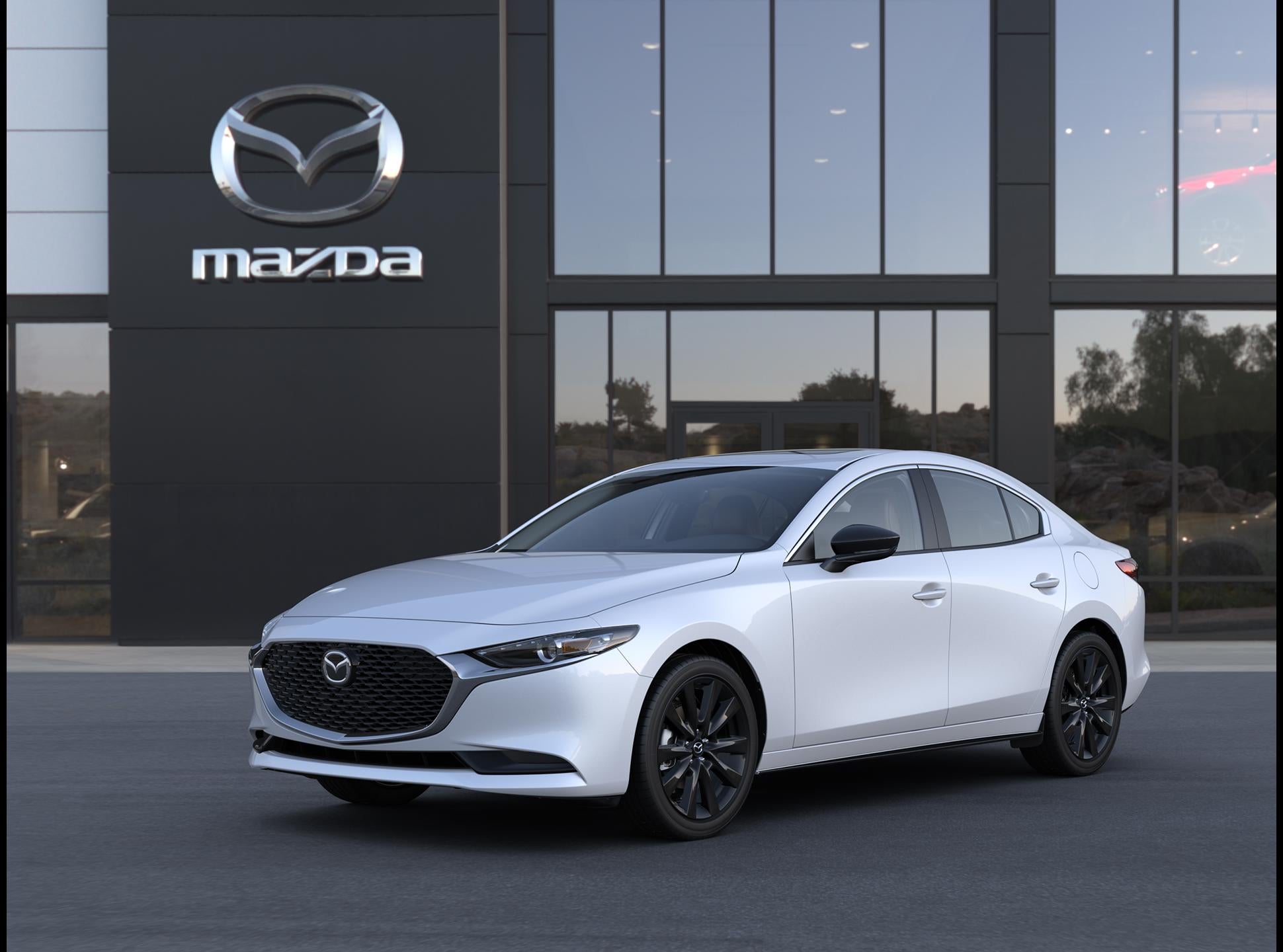 2026 Mazda Mazda3 Sedan 2.5 S Carbon Edition AWD in Snowflake White Pearl Mica — front three-quarter view