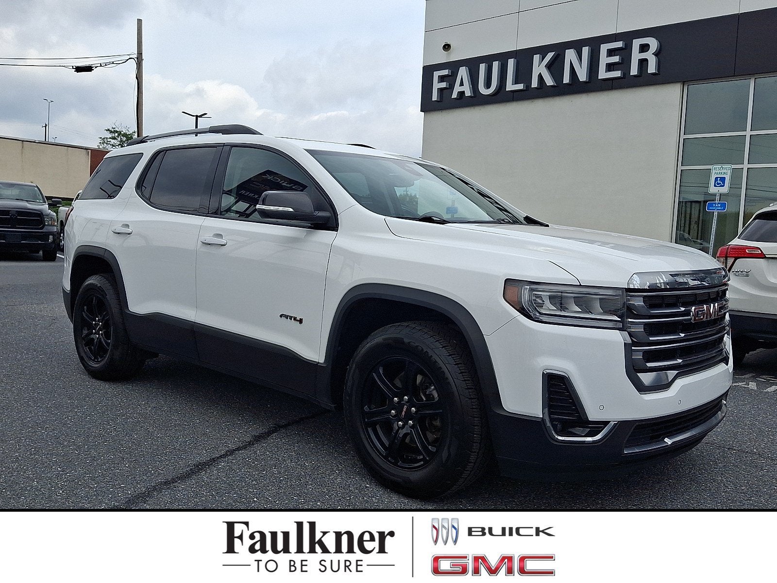 2021 GMC Acadia AT4 in Summit White — front three-quarter view