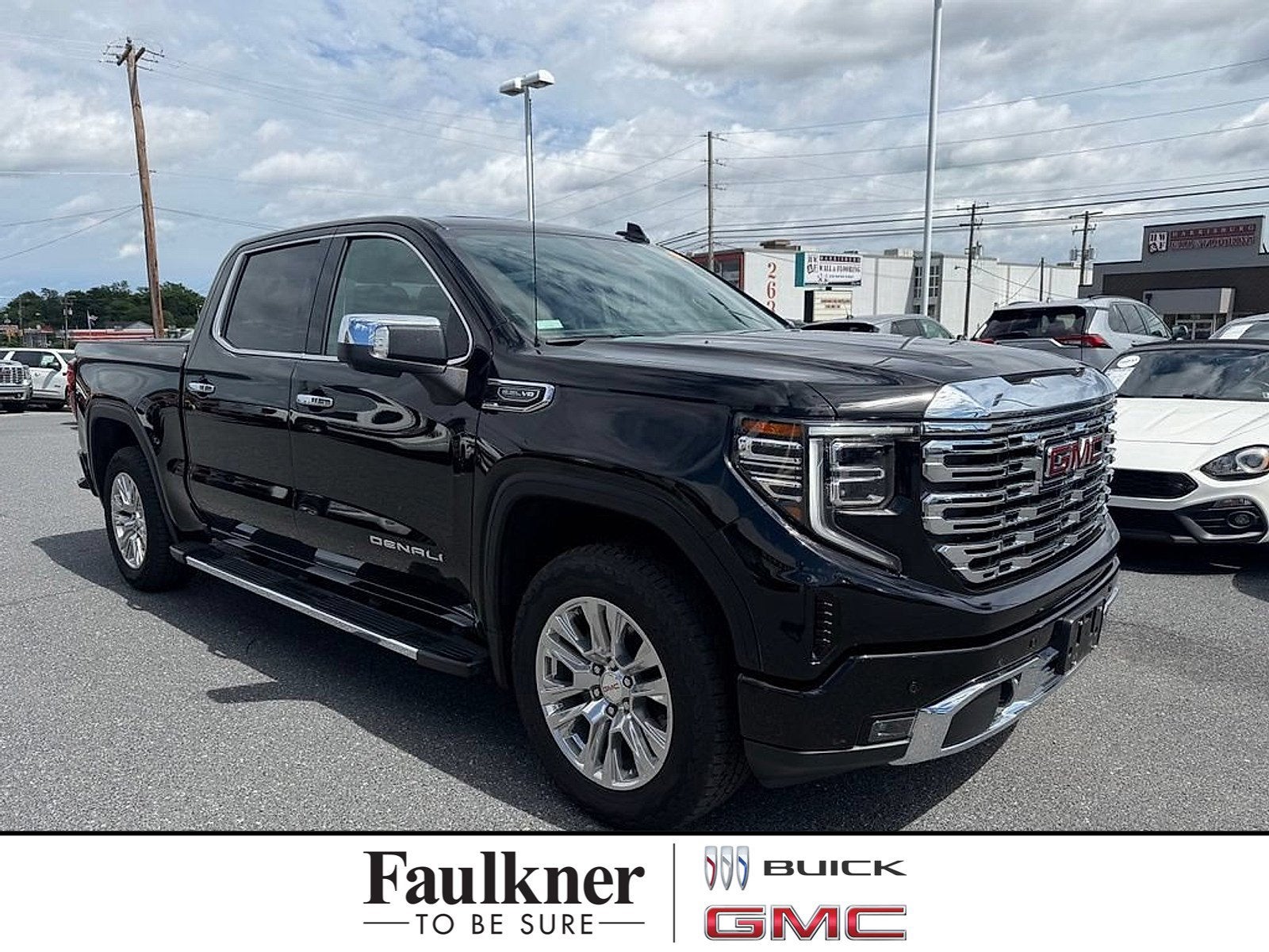 2024 GMC Sierra 1500 Denali in Onyx Black — front three-quarter view