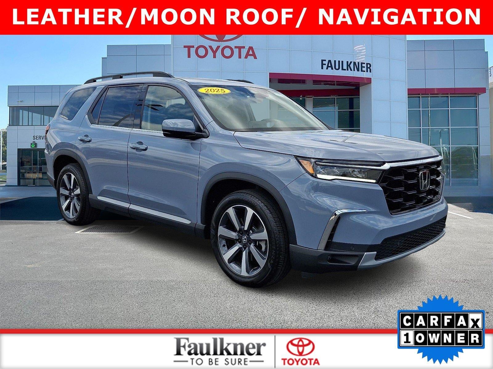 2025 Honda Pilot Touring AWD in Sonic Gray Pearl — front three-quarter view