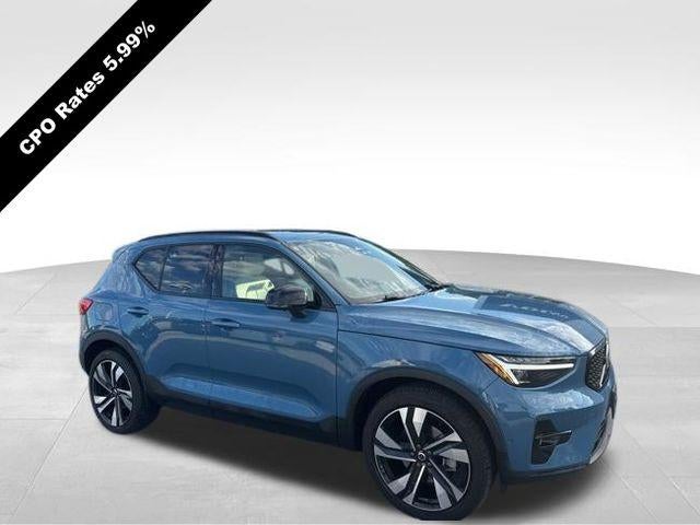 2023 Volvo XC40 B5 AWD Ultimate Dark Theme in Fjord Blue Metallic — front three-quarter view
