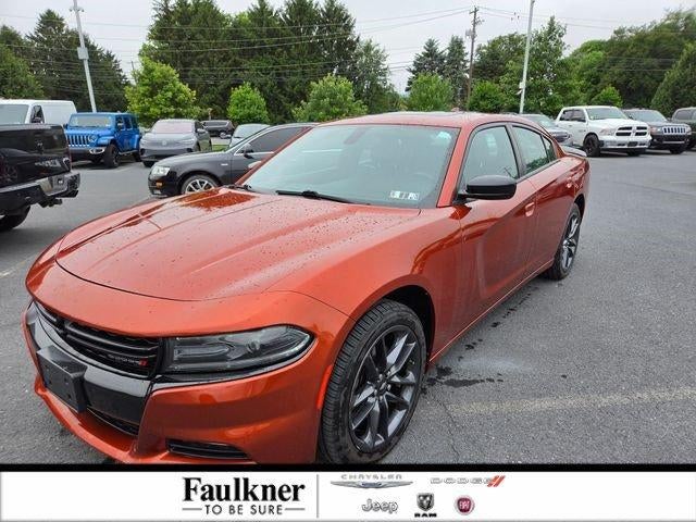 2021 Dodge Charger SXT AWD in Sinamon Stick — front three-quarter view