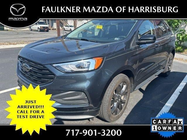 2023 Ford Edge SE AWD in Blue Metallic — front three-quarter view