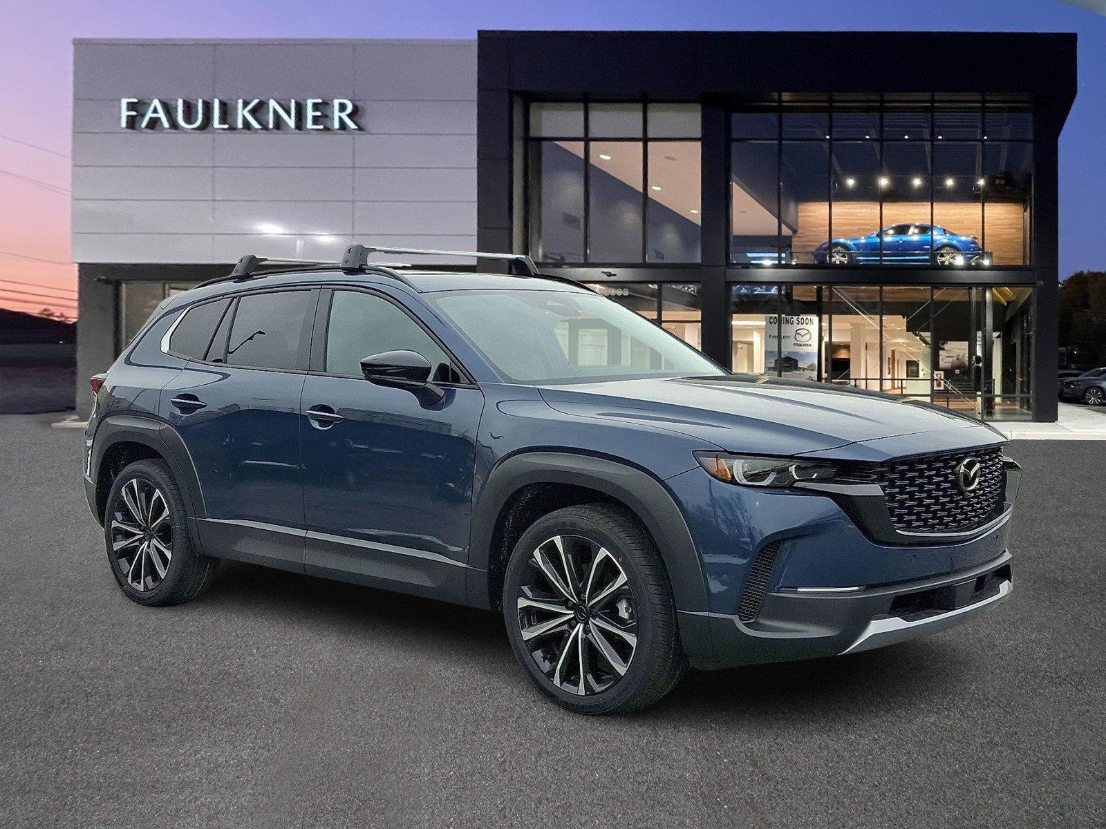 2026 Mazda Mazda CX-50 2.5 Turbo Premium Plus AWD in Ingot Blue Metallic — front three-quarter view