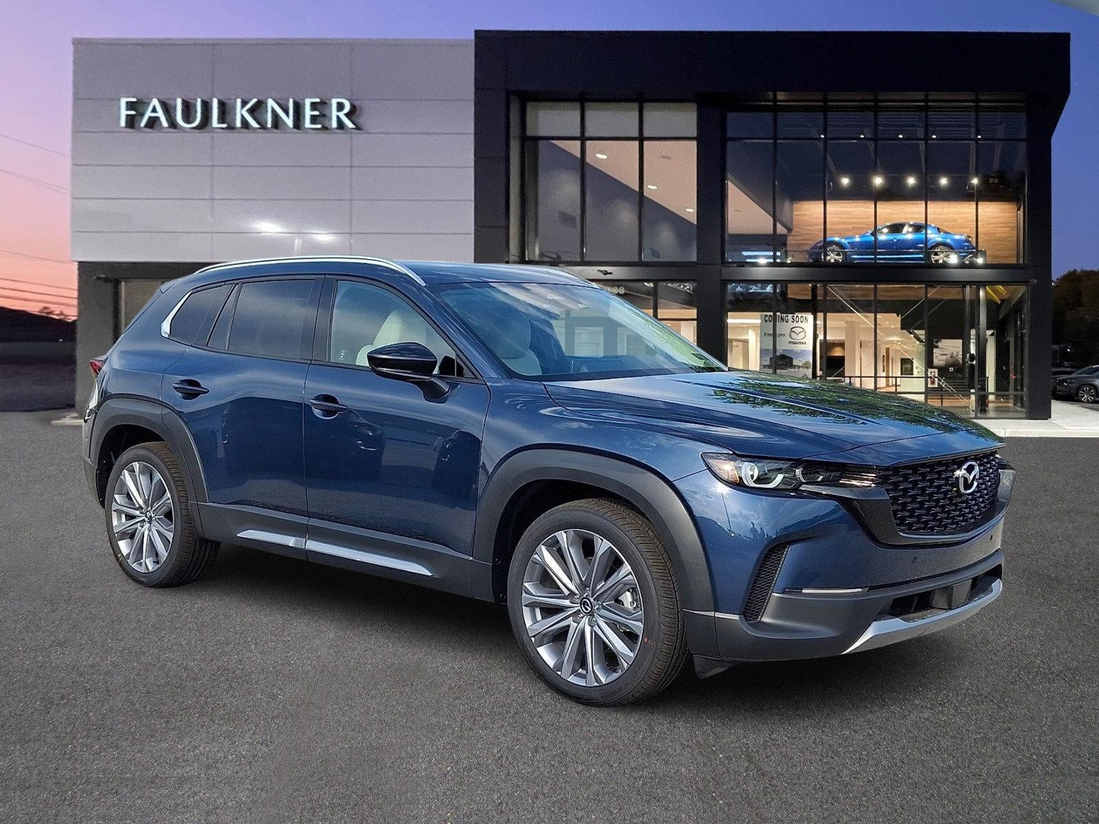 2026 Mazda Mazda CX-50 2.5 Turbo Premium Plus AWD in Ingot Blue Metallic — front three-quarter view